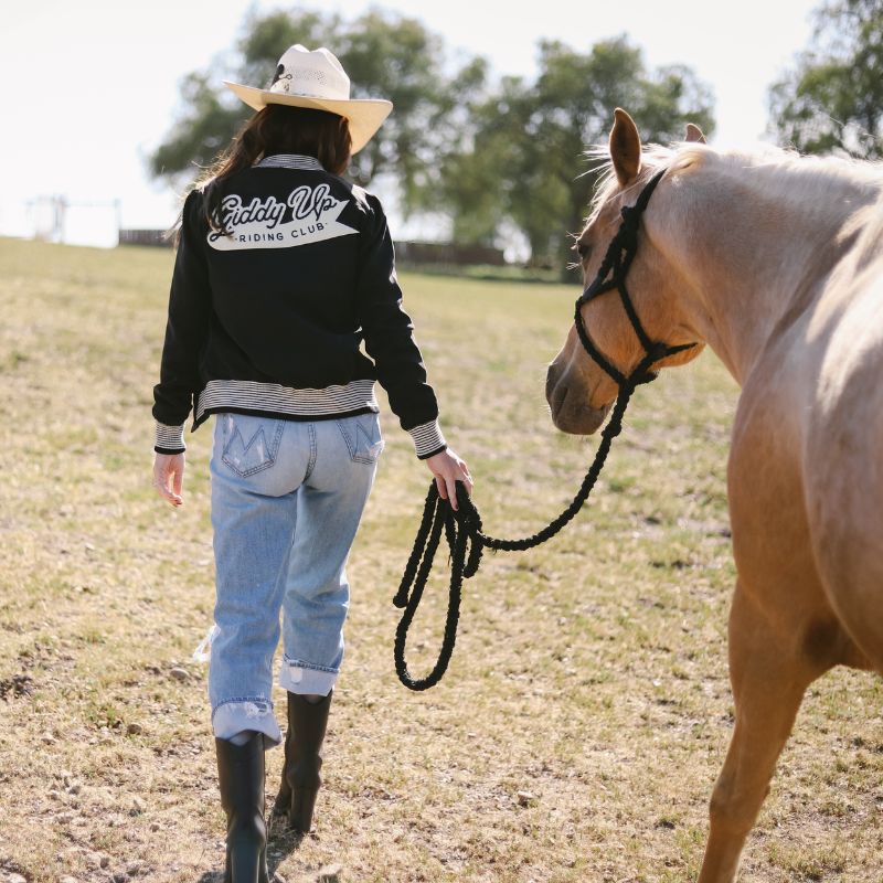 street-and-saddle-riding-club-varsity-jacket-4hooves-cowgirl-back